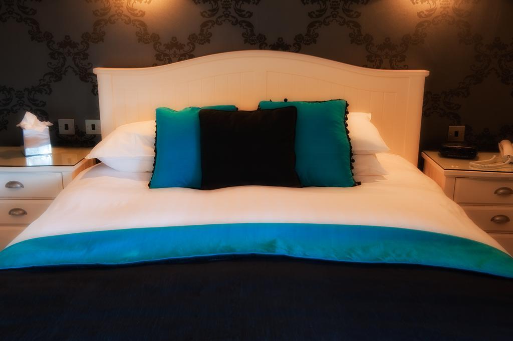 מלון הרוגייט The Grafton מראה חיצוני תמונה A bed with cushions
